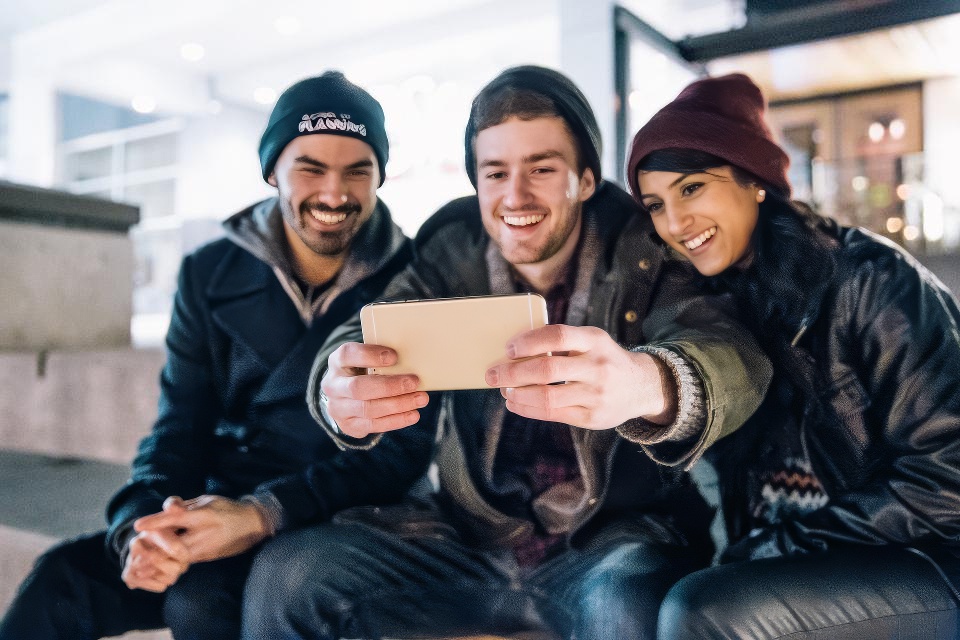 Young adults looking at content